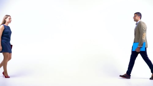 Two Business Partners Shake Hands Welcoming Each Other in Studio