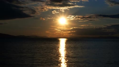 Seascape And Clouds In Sunset