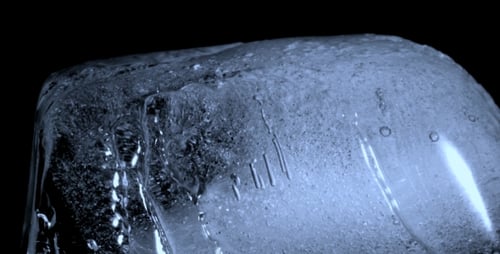 Melting Ice Block Time Lapse Close Up