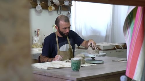 Potter Working in the Pottery Working Place