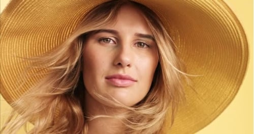 Beautiful Woman in a Sun Hat Close Up