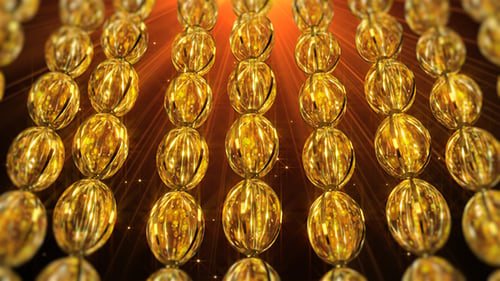 Luxurious Gold Beads Sparkling Motion Background