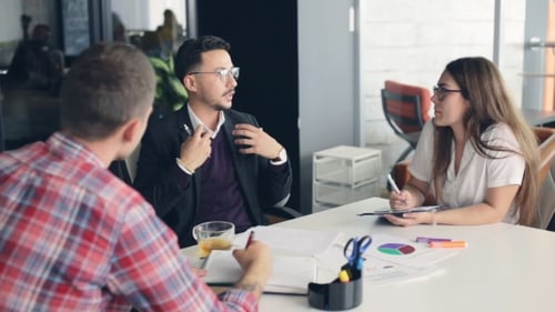 Group of Business People Meeting in Office