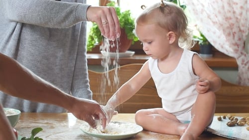 Young Family Having Fun in the Kitchen.