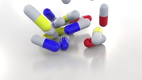 Falling Multicolor Drug Capsules or Pills