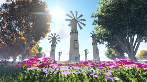 Windmills Rotating in a Sunny Flower Field Landscape
