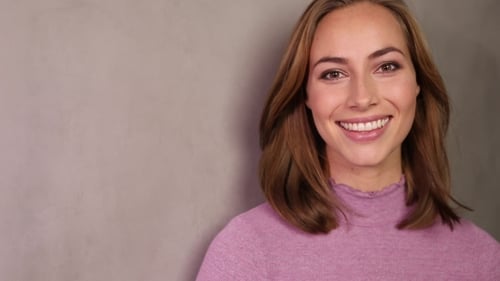 Attractive Woman Smiling Portrait in Studio