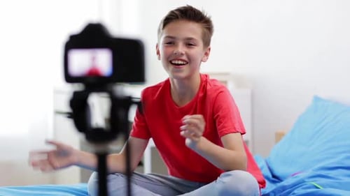 Teen Vlogging on Camera in Bedroom