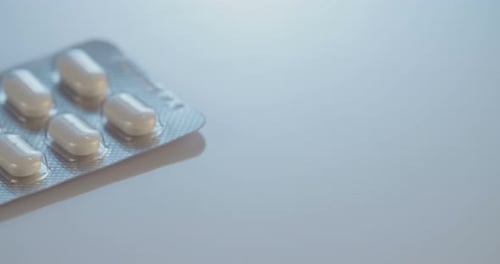 Blister Pack Full of White Oblong Pills