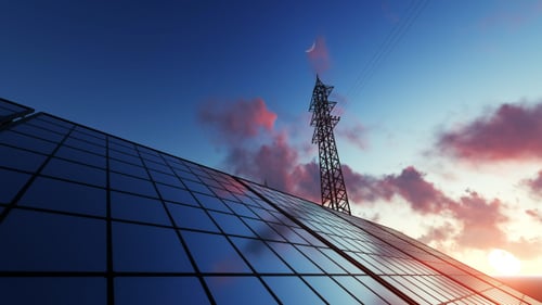 Renewable Energy: Solar Panels and Power Tower at Sunset Animation