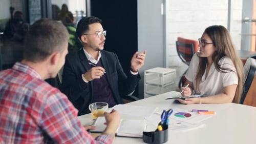 Coworkers in a Modern Office Working on Project in Company