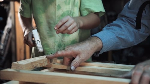 Carpenter and Grandson in Shop