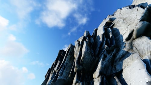 Animated Rocky Cliff with Shifting Light and Shadows