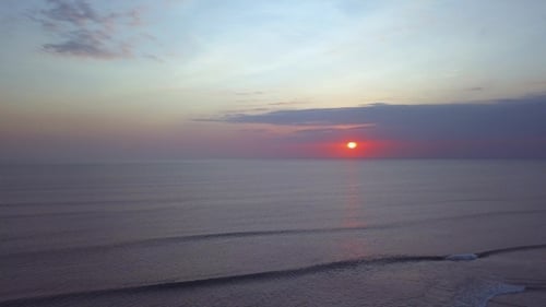 Peaceful Ocean Sunset Aerial View