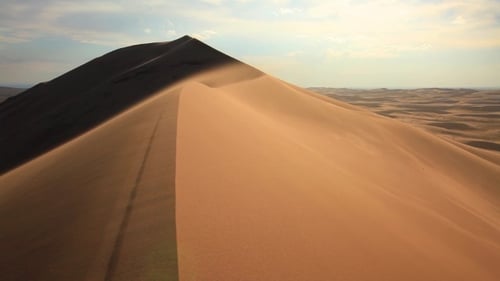 Beautiful Sunset in the Desert. Sandstorm on the Dune