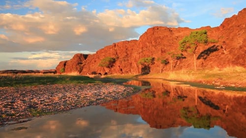 Beautiful Mountain River in the Canyon at Sunset