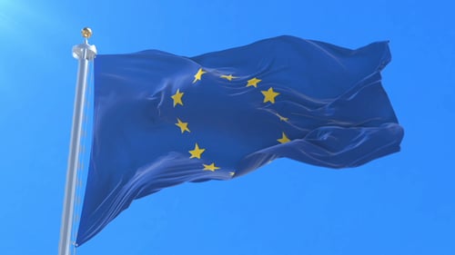 Waving European Union Flag Against Clear Blue Sky