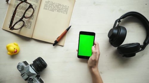 Overhead View of Phone With Green Screen