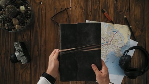 Mans Hands Open Handmade A4 Notebook with Real Leather Cover