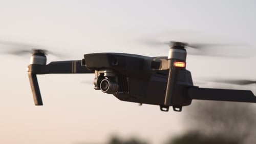 Black Flying Drone on White