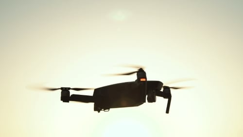 Black Flying Drone on White