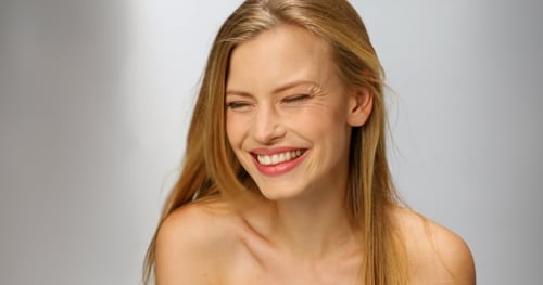 Beautiful Blonde Woman Smiling and Posing