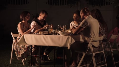 Friends Dining in Garden