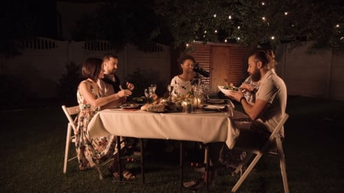 Friends Dining in Garden