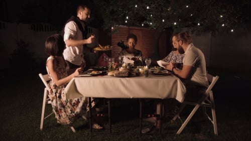 Friends Dining in Garden
