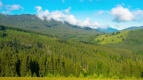 Mountain Landscape with a Fast Clouds and Shadows