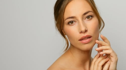 Attractive Woman Poses Elegantly in Close Up