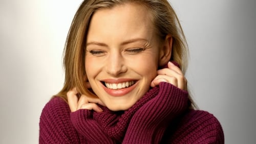 Smiling Woman with Burgundy Sweater
