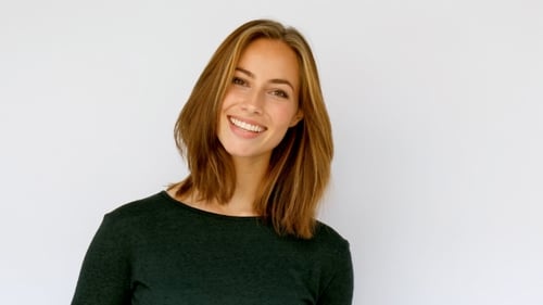 Cheerful Woman Smiling and Posing in Studio