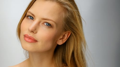 Beautiful Woman Close Up Portrait with Blue Eyes