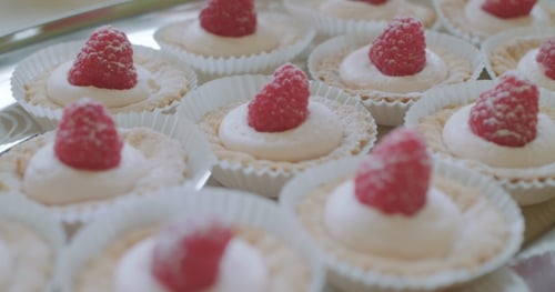 Mini Tarts Topped with Fresh Red Raspberries