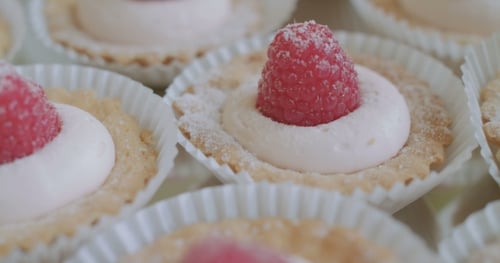 Close Up of Delicious Raspberry Cream Tarts