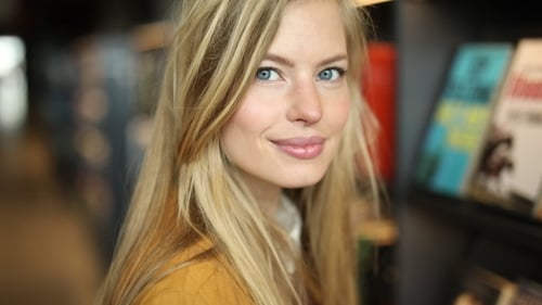 Close-up of Beautiful Woman Smiling at Camera