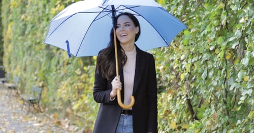 Laughing Woman with Umbrella