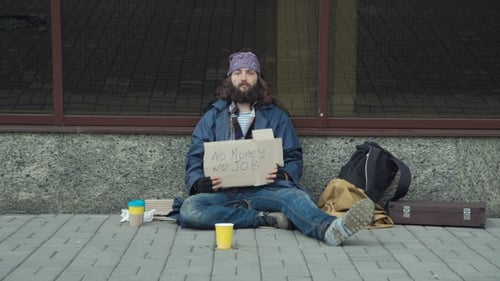 Poor Unemployed Man Begging in Street