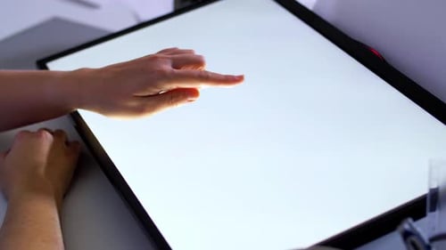 Hand Interacts with Interactive Digital Touchscreen