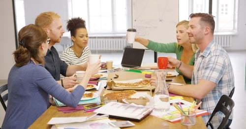 Team Having Lunch Together in Office