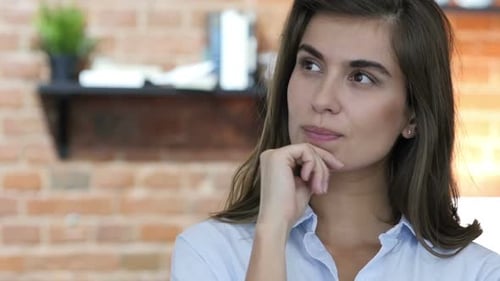 Woman Thinking with Hand on Chin