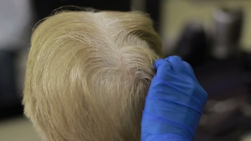 Applying Dye To Blonde Hair at Salon