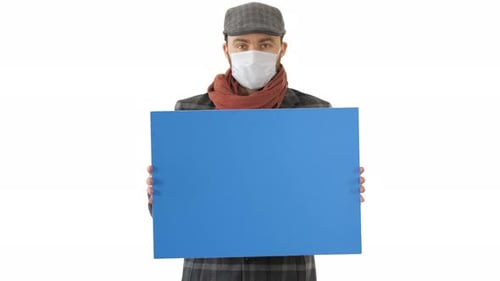 Young Adult Holding Blue Sign With Face Mask