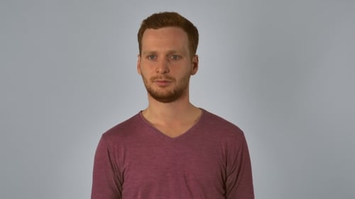 Red-haired Man Makes OK Hand Gesture