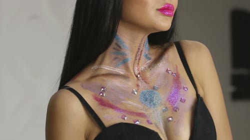 Woman Posing with Body Glitter and Jewels