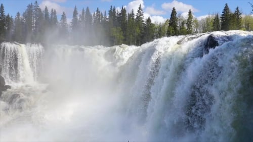 Majestic Waterfall Cascading in Natural Landscape