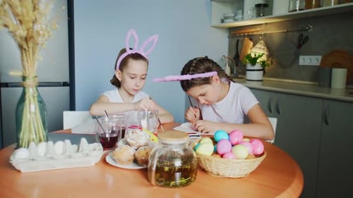Little Girls Paints Eggs