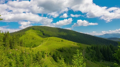 Mountain Landscape with a Fast Clouds and Shadows