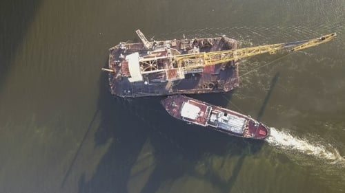 Tugboat Tow Barge Train Along City River